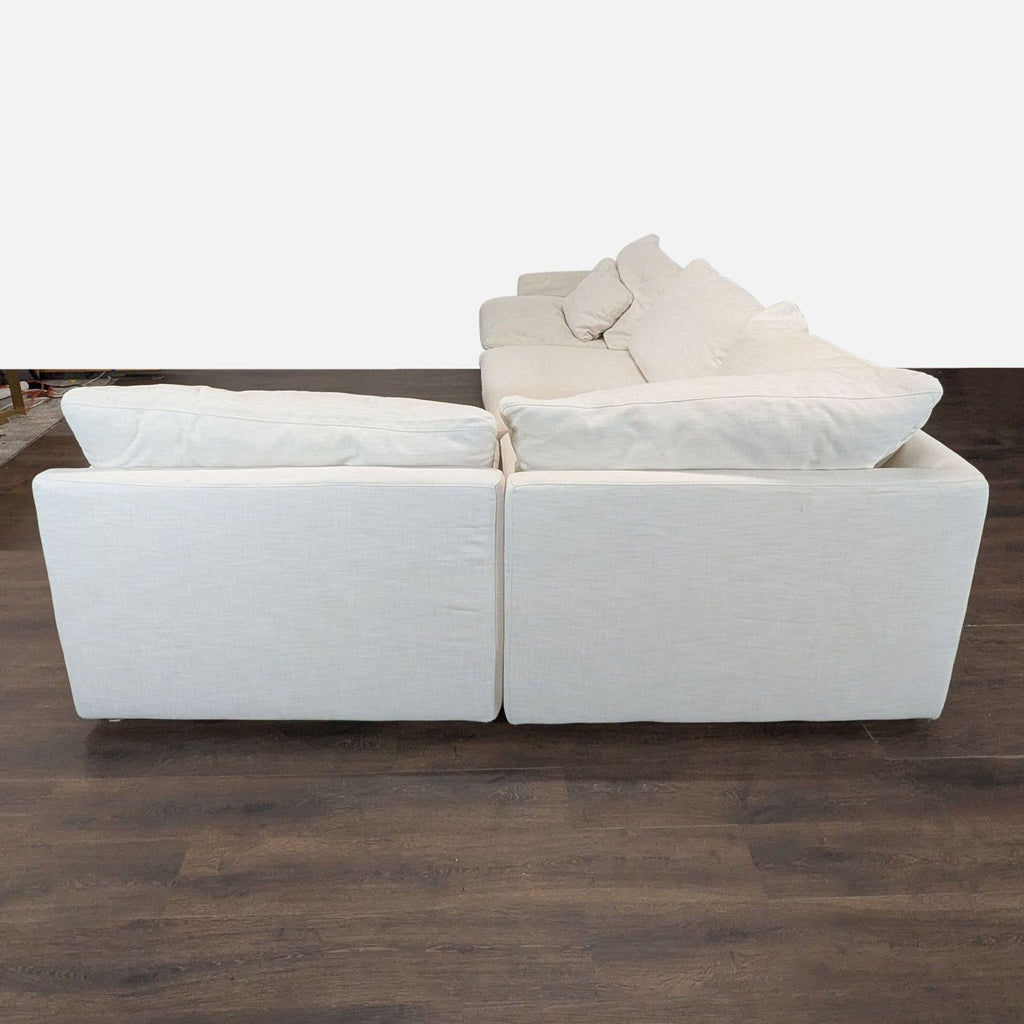 Modern cream sectional sofa with ample seating from Restoration Hardware, perfect for stylish living rooms.