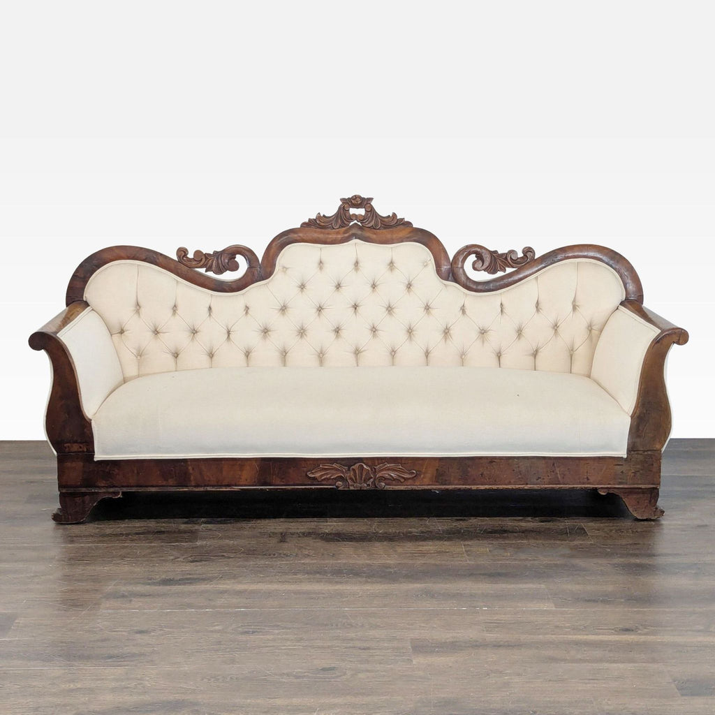 Elegant 3-seat sofa with cream tufted upholstery and a carved wooden frame, perfect for vintage-inspired living rooms.  
