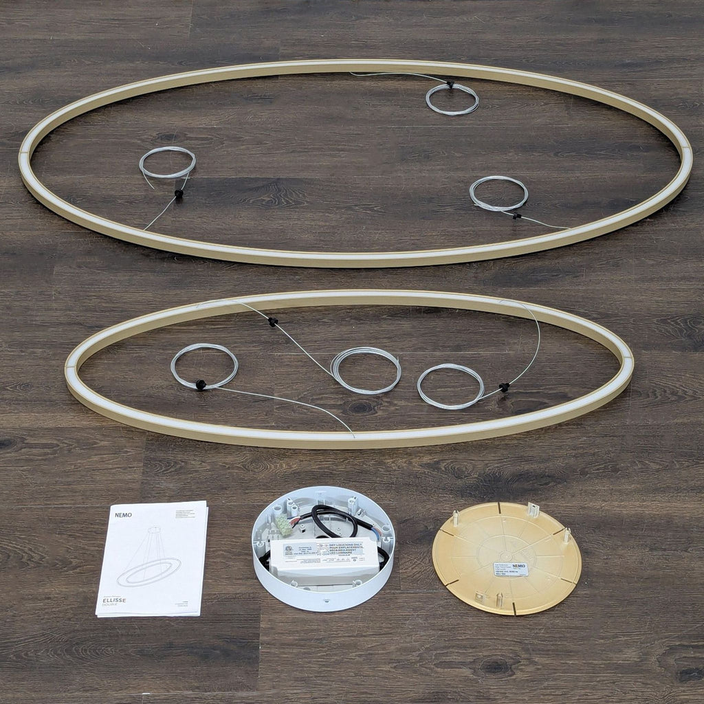Modern Nemo Lighting Ellisse Double suspension lamp set, including LED rings and installation hardware.
