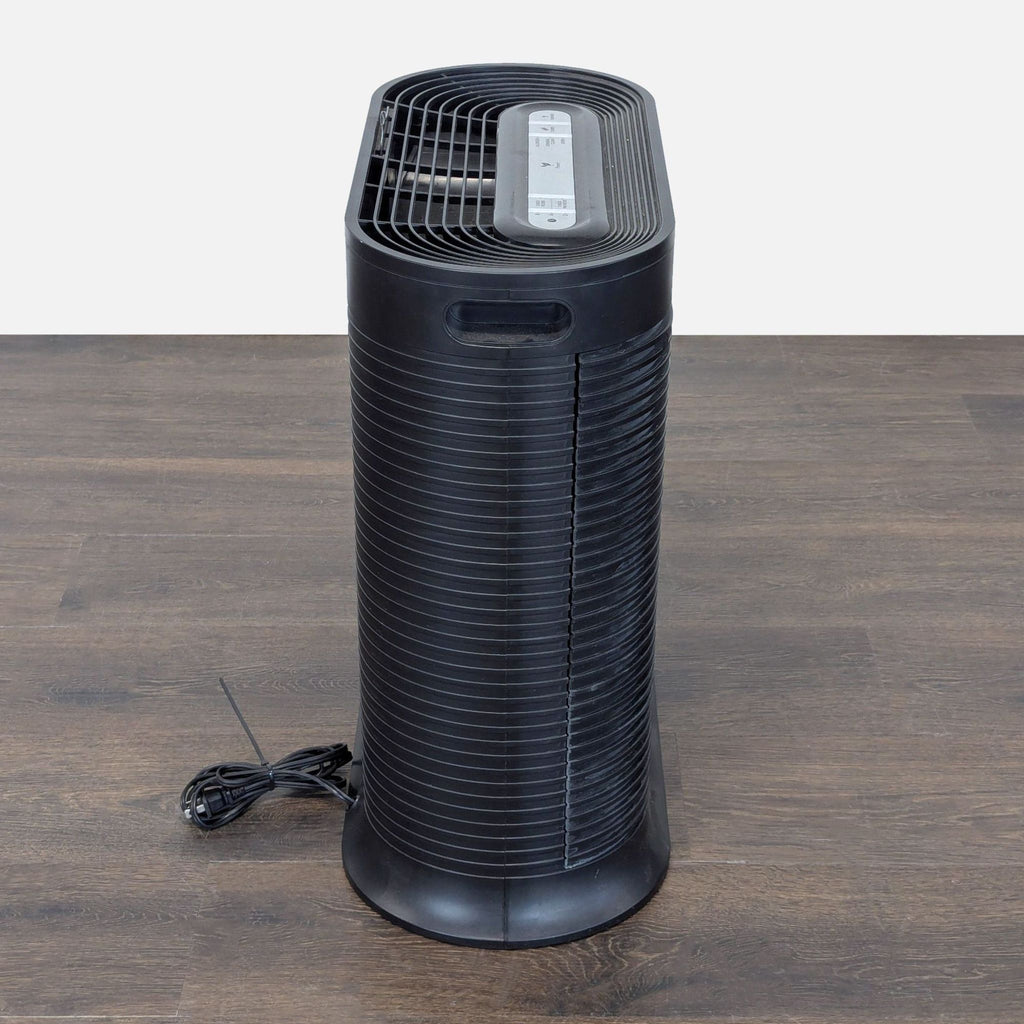 Honeywell AC & Fans purifier, sleek and easy to maintain, features multiple modes and corded power connection.