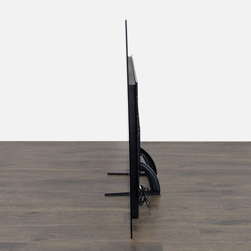 Large Sony 4K TV with slim bezels and stands, featuring Android TV and easy streaming access.