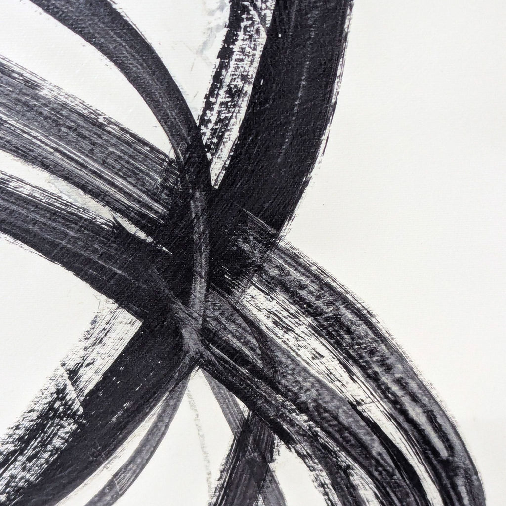 2. Close-up of black brushstrokes on white canvas, showing texture and detail of modern abstract artwork.