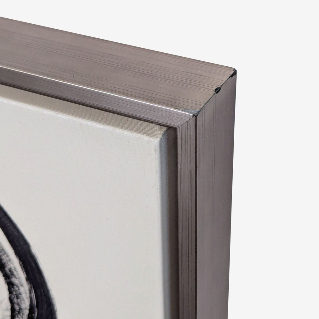 3. Detailed view of the painting’s metallic frame, highlighting its clean edges and contemporary finish.