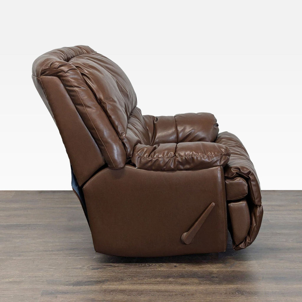 Side view of a brown leather lounge recliner chair highlighting its thick cushioning and reclining lever.