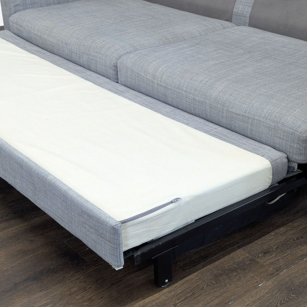 Modern Gray Sleeper Sofa with Pull-Out Bed and Pillow