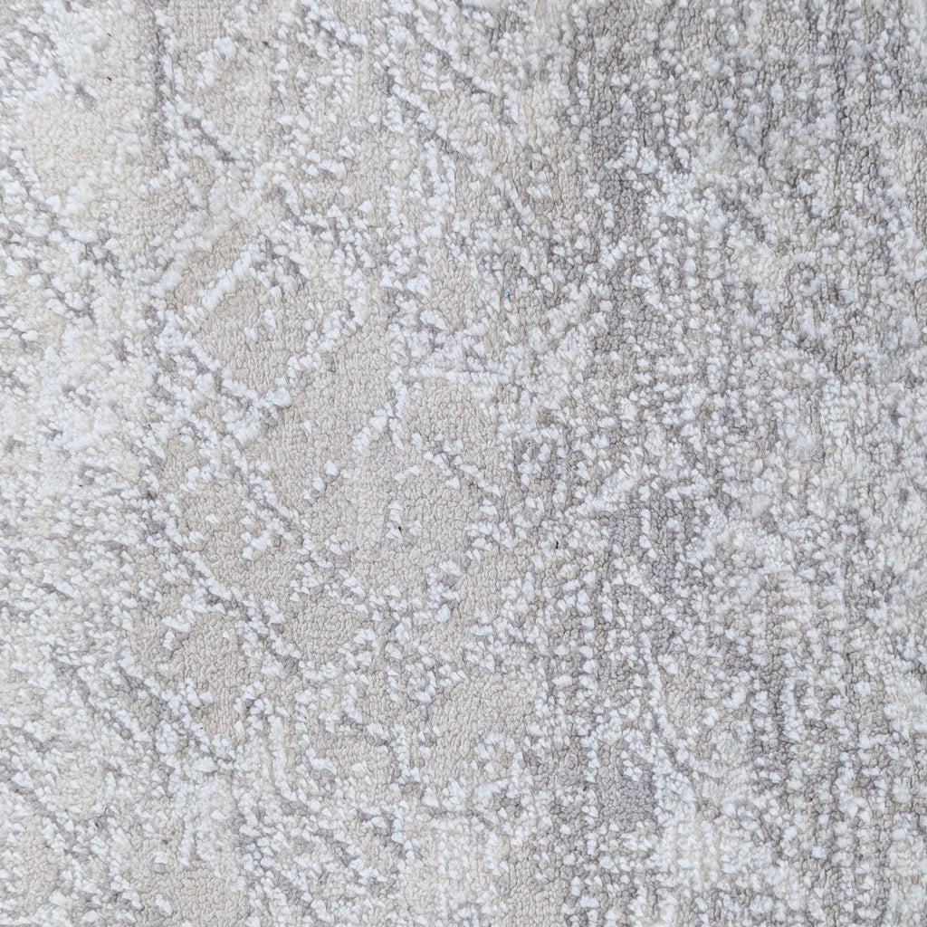 2. Close-up of the Calvin Klein rug showing its soft, high-quality material and elegant woven texture.  