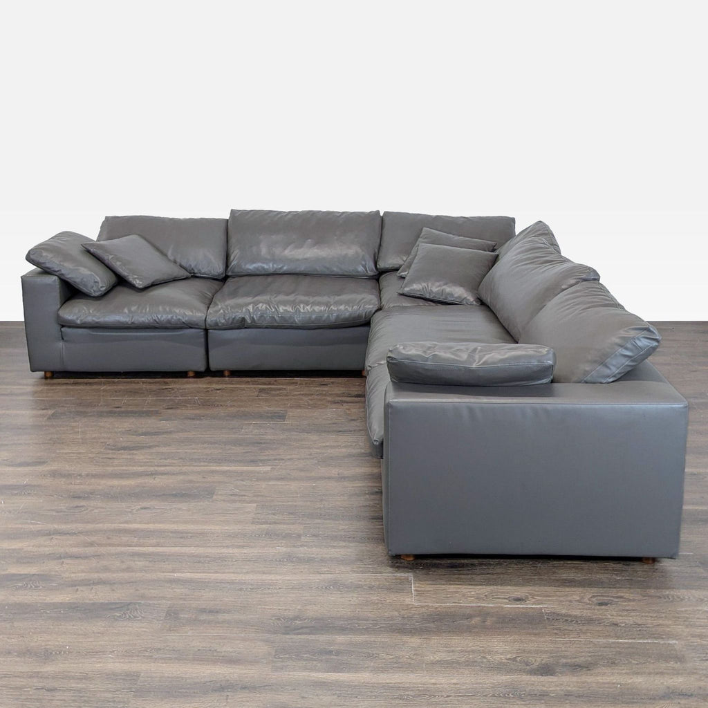 Spacious Modway L-shape sectional in soft grey vegan leather, featuring plush down-filled cushions for comfort.