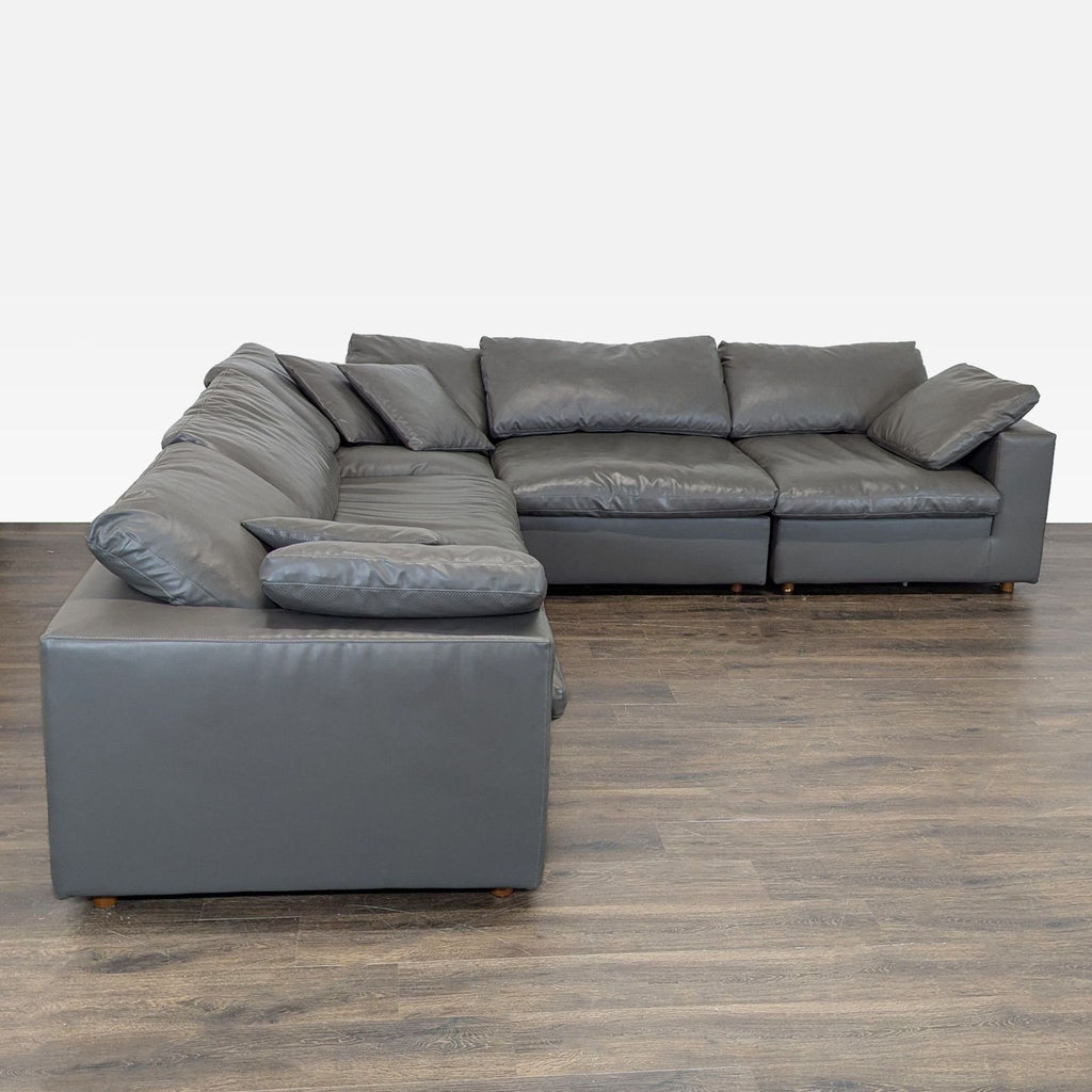 Modern Modway sectional sofa in grey vegan leather, offering ample seating and supportive, cozy down cushions.