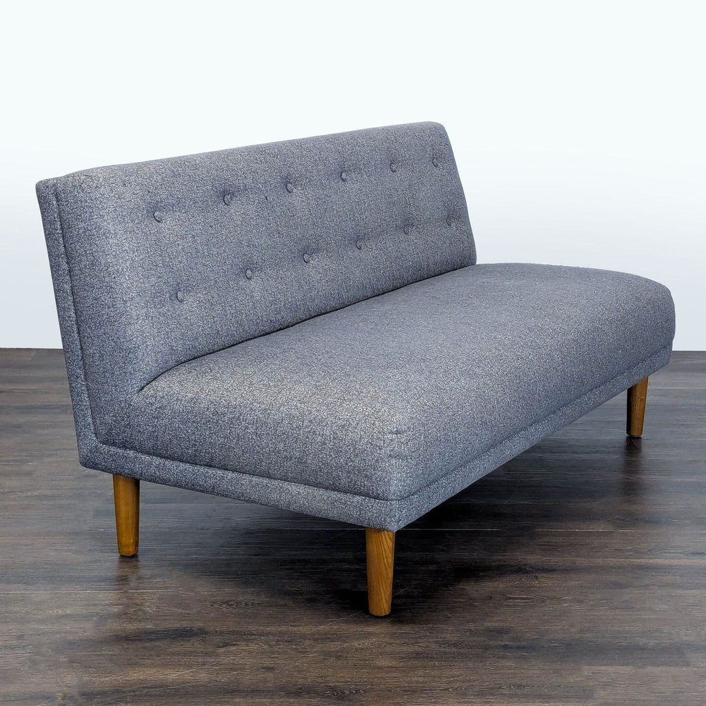 Contemporary gray loveseat by Jason Furniture, featuring soft upholstery and compact design, ideal for small spaces.