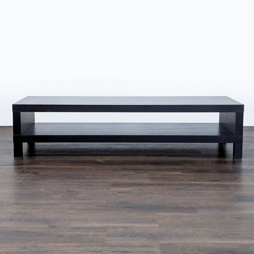1. Black rectangular IKEA entertainment center with open lower shelf, shown on dark wood flooring, front view.
