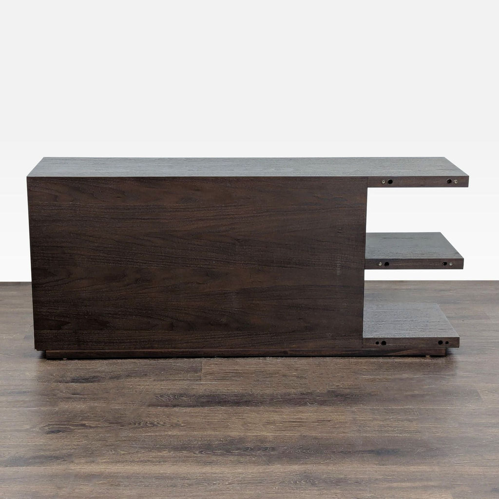 3. Contemporary dark wood bookshelf with sturdy construction and wide shelves for storage or display.