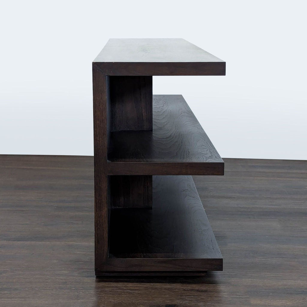 Sturdy three-shelf bookcase with clean lines and ample space, ideal for living rooms, offices, or bedrooms.