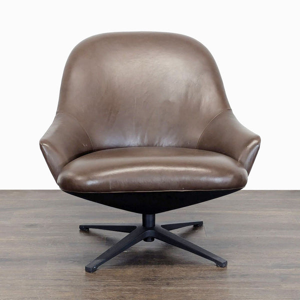 Front view of Article lounge chair with soft brown leather, curved seat, and modern swivel base for comfort.
