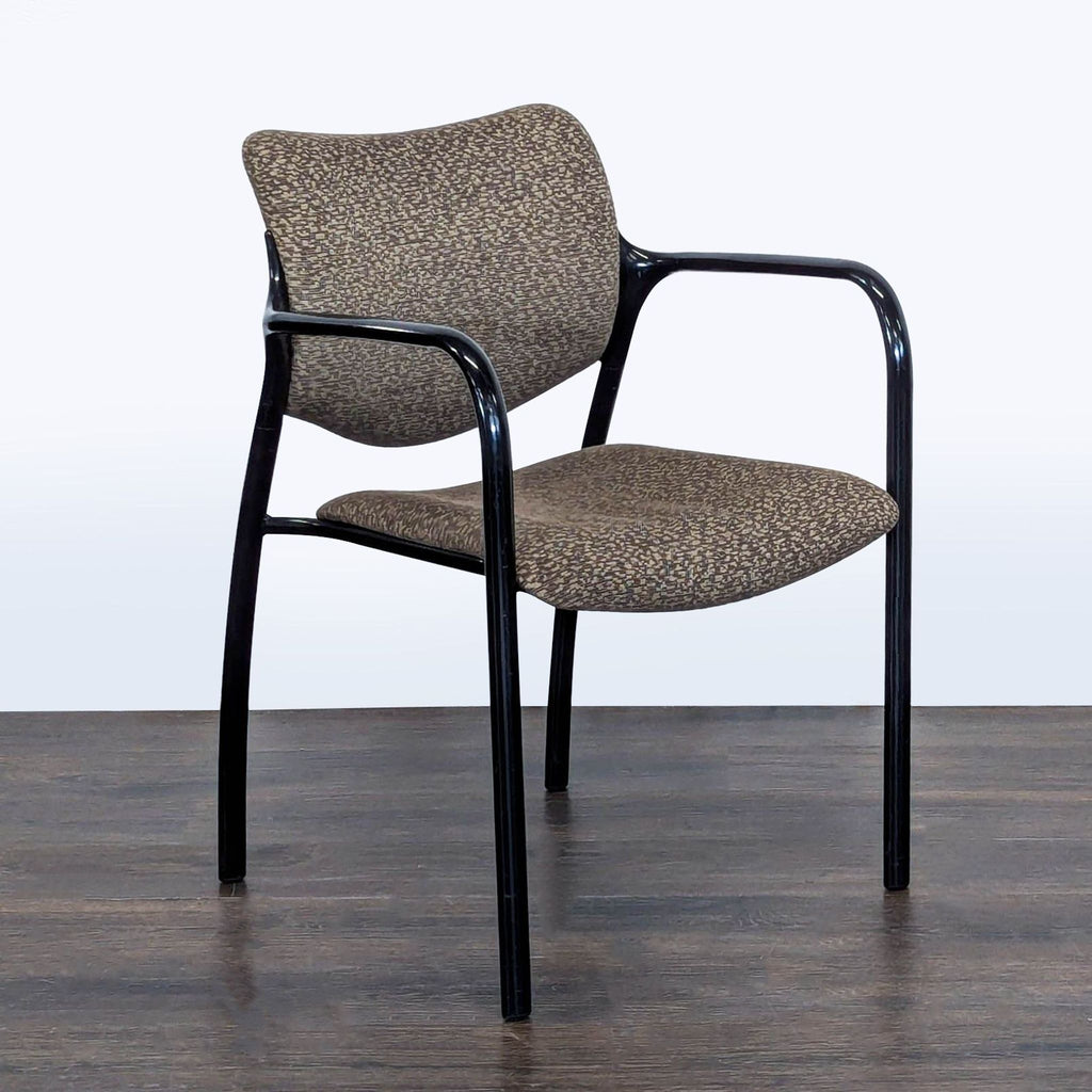 Stylish brown fabric guest chair by Herman Miller, featuring padded seat, backrest, and supportive armrests.