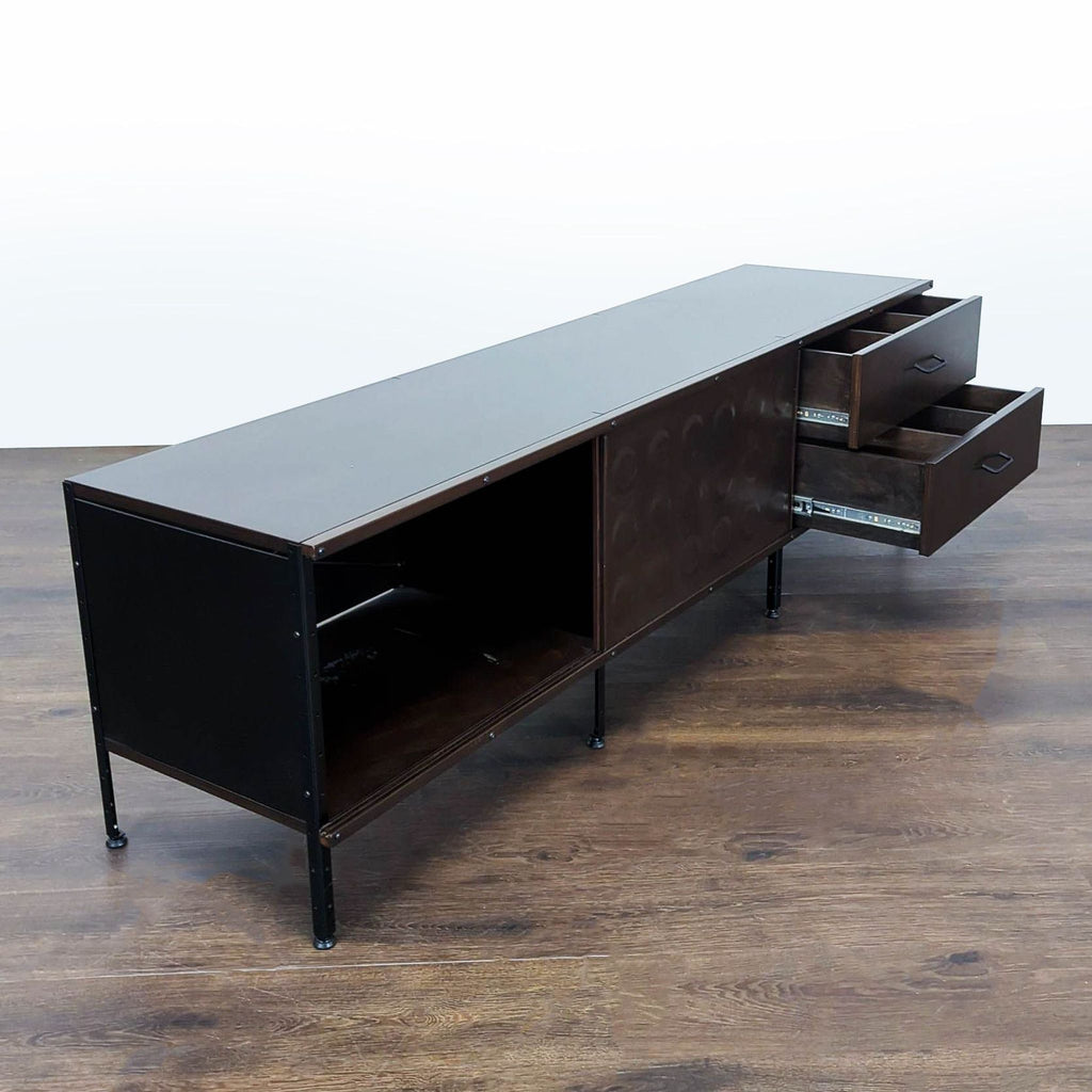 Entertainment center by Modernica; features molded plywood drawers, colorful panels, and zinc-coated steel frame.