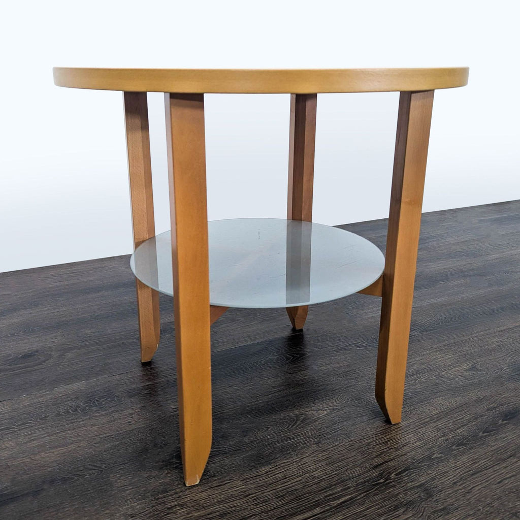 1. Round wooden end table with four legs and a lower circular glass shelf, placed on dark flooring.
