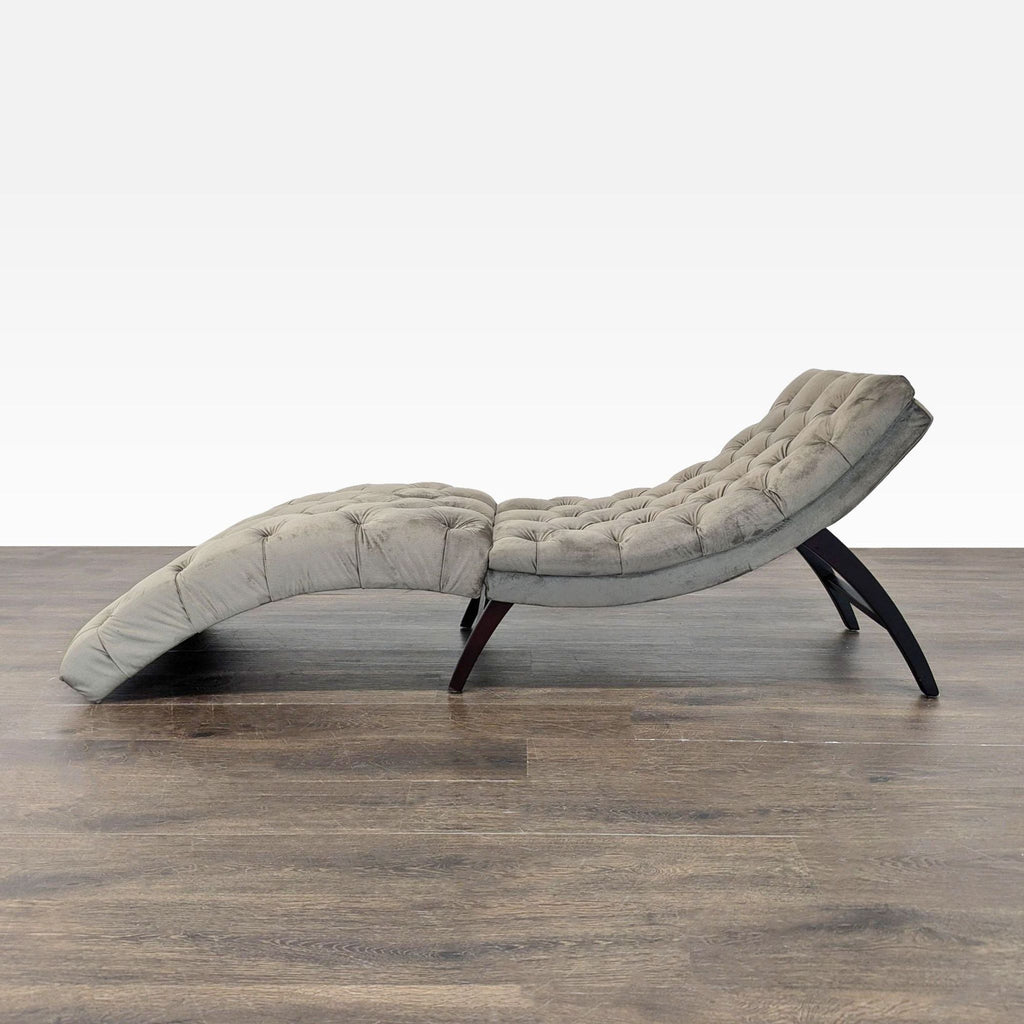 Elegant Noble House Home chaise featuring soft gray velvet, button tufting, and a supportive curved shape.