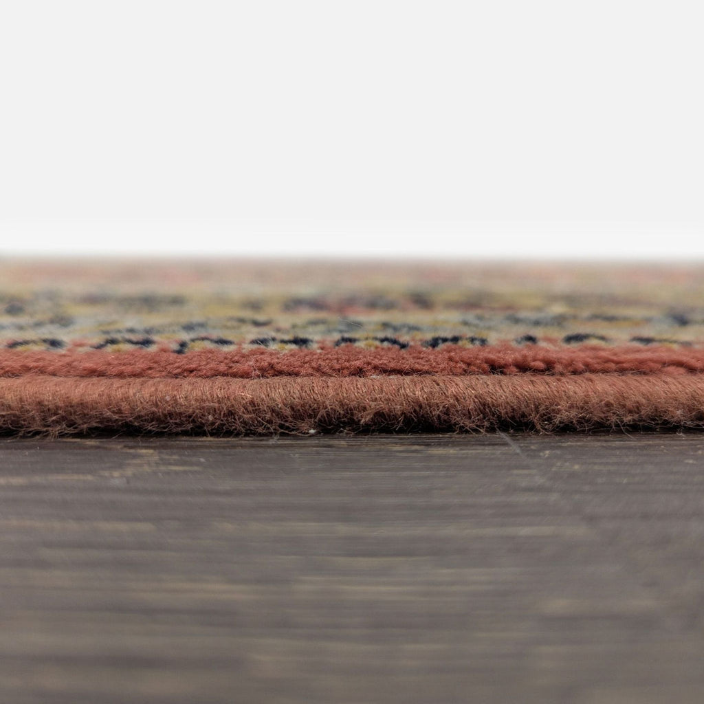 3. Side view of Couristan Persian-style rug, highlighting its dense, plush pile and sturdy edge.