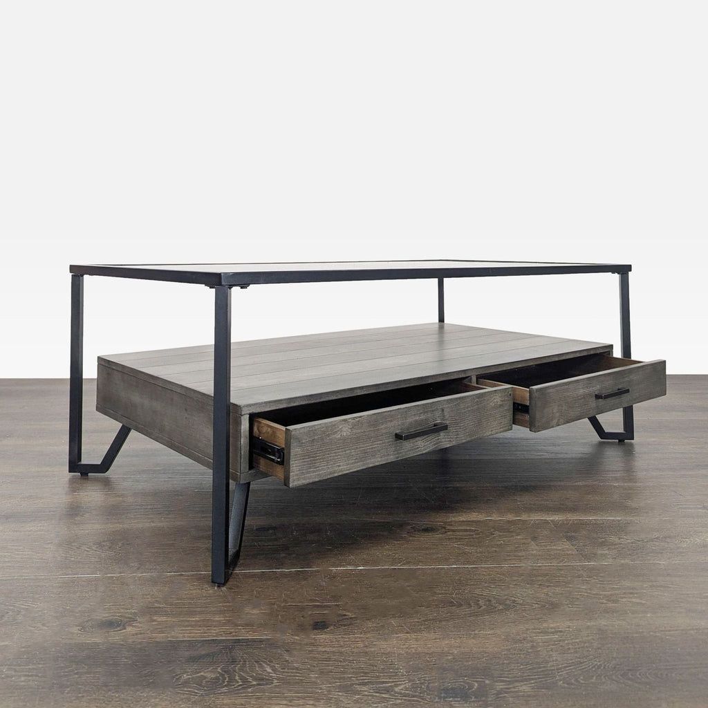 Coffee table with an industrial design, metal frame, and dual storage drawers.