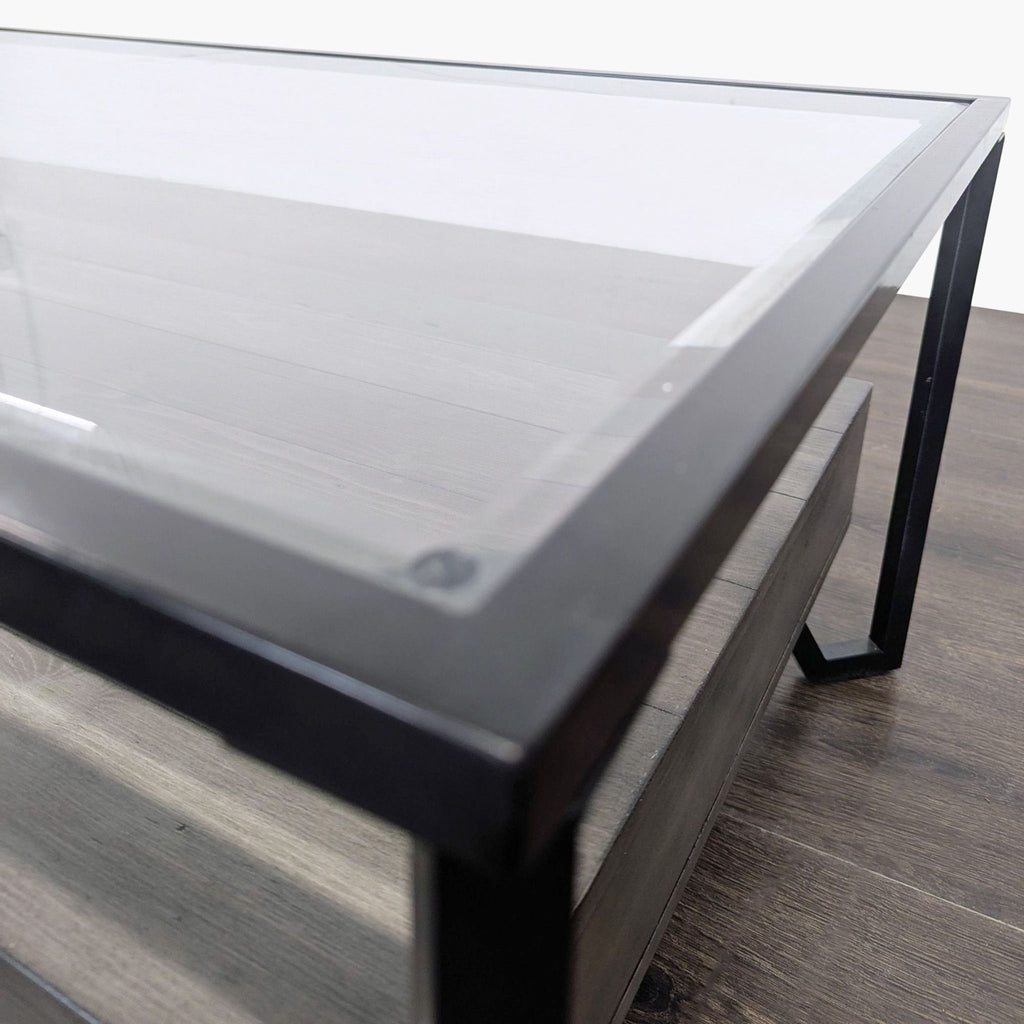 Two-drawer industrial coffee table with metal framing, ideal for modern interiors.