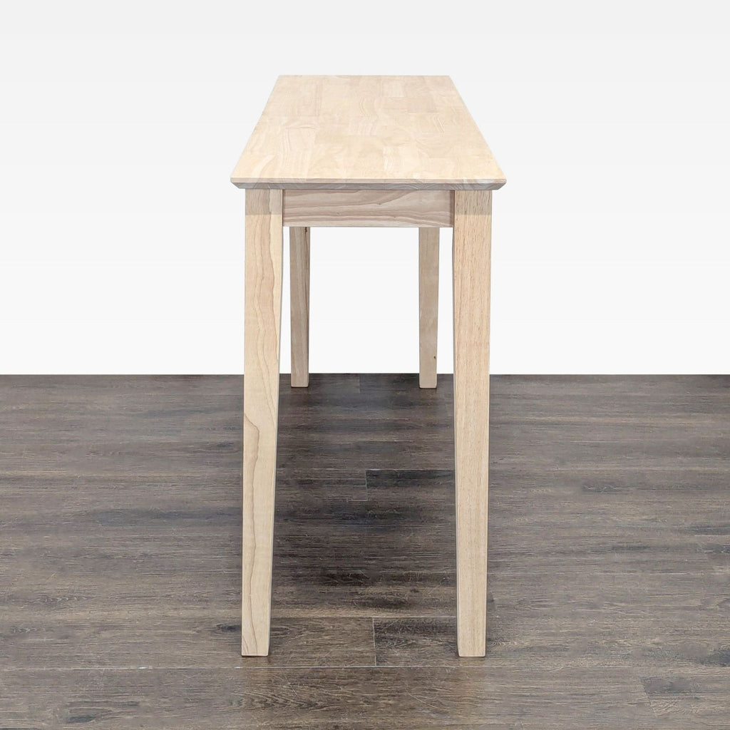3. End view of a rectangular rubberwood console table by Gracie Oaks, can be painted, stained, or left natural.