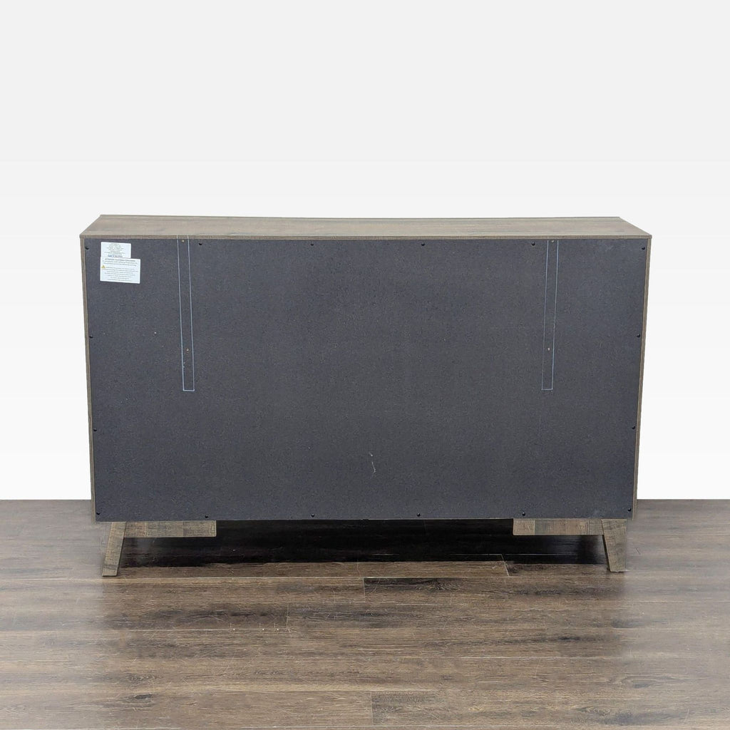 3. Back view of the Crown Mark dresser, highlighting its sturdy build and simple rectangular design.
