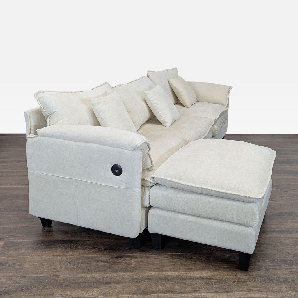Soft beige 3-seat sectional with spacious chaise and five pillows, offering comfort and style for any decor.