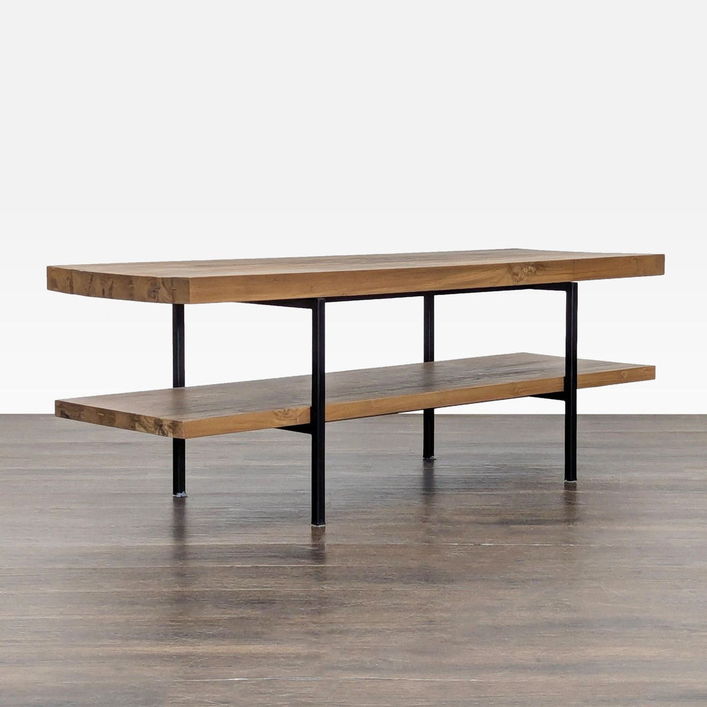 2. Angled view of EQ3 entertainment center featuring thick wooden shelves and slim black metal supports.