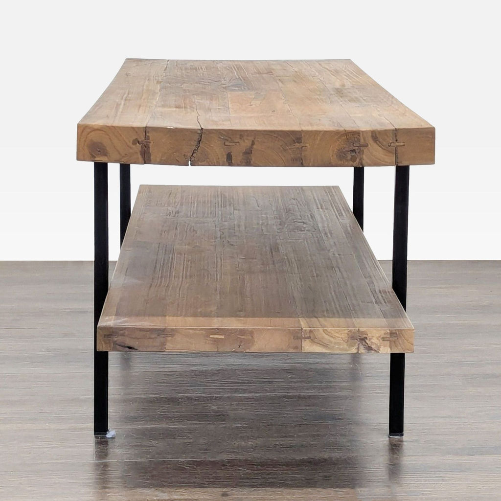 1. Front view of EQ3 entertainment center with two wooden shelves and black metal legs.