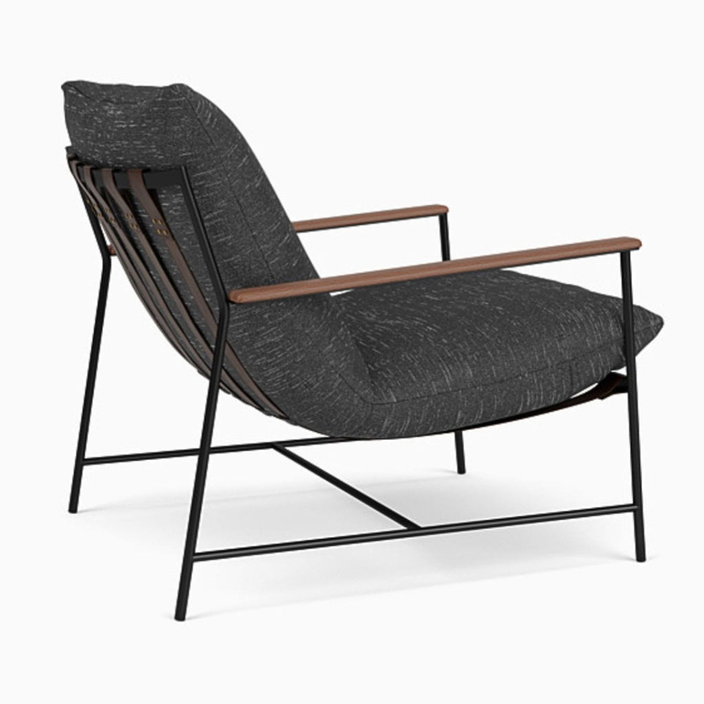 Modern lounge chair from Denver Modern with a black cushion and wooden highlights, ideal for living areas.