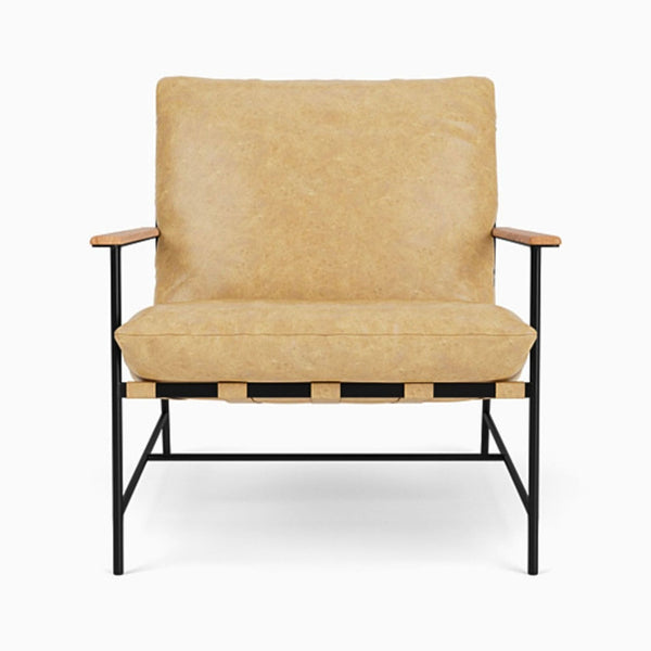 Denver Modern tan leather lounge chair with black frame and wooden armrests in a minimalist style.