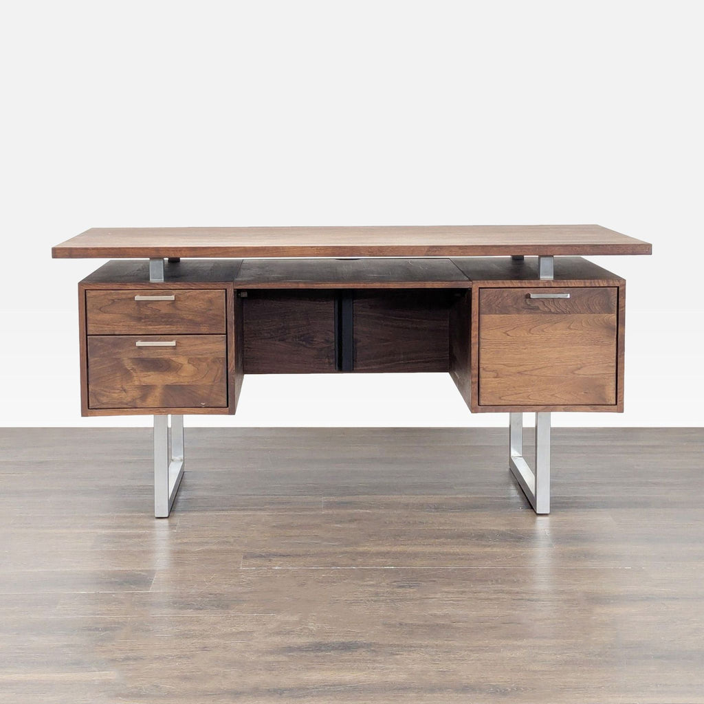 Front view of a Crate & Barrel walnut wood and metal desk with floating top, drawers, and open workspace.