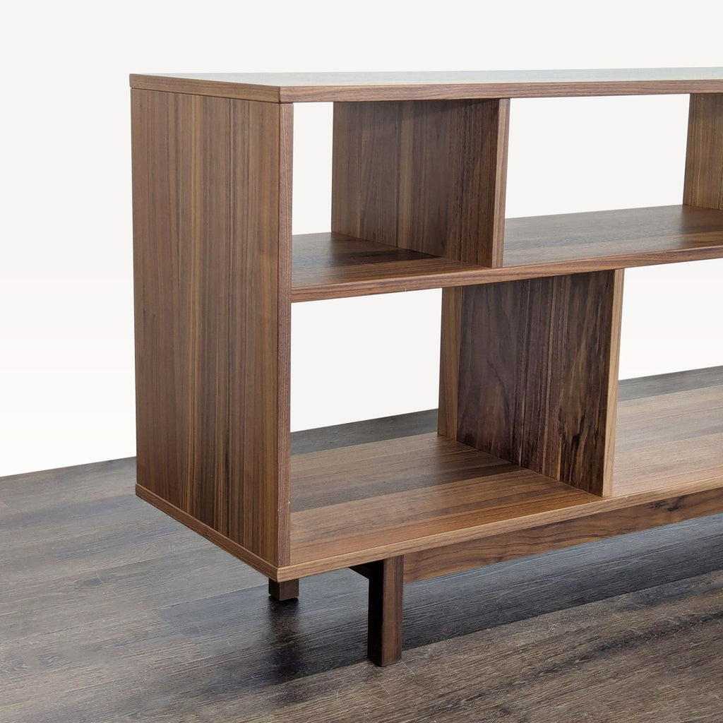 2. Closeup of the Room & Board bookshelf showcasing its clean lines, wooden texture, and sturdy contemporary design.