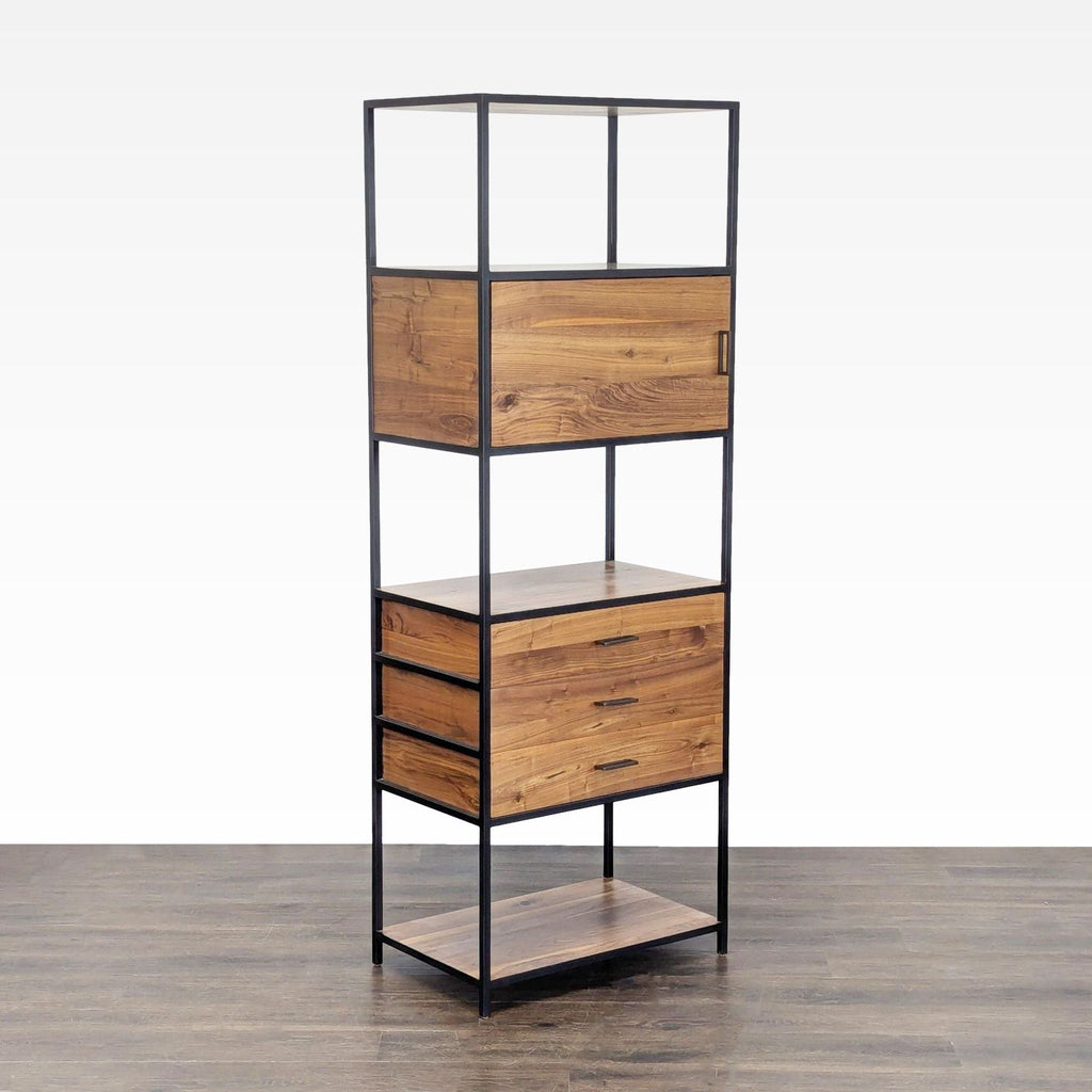 2. Bookshelf with black frame, natural wood shelves, two drawers, and cabinet, by Crate & Barrel, front angled view.