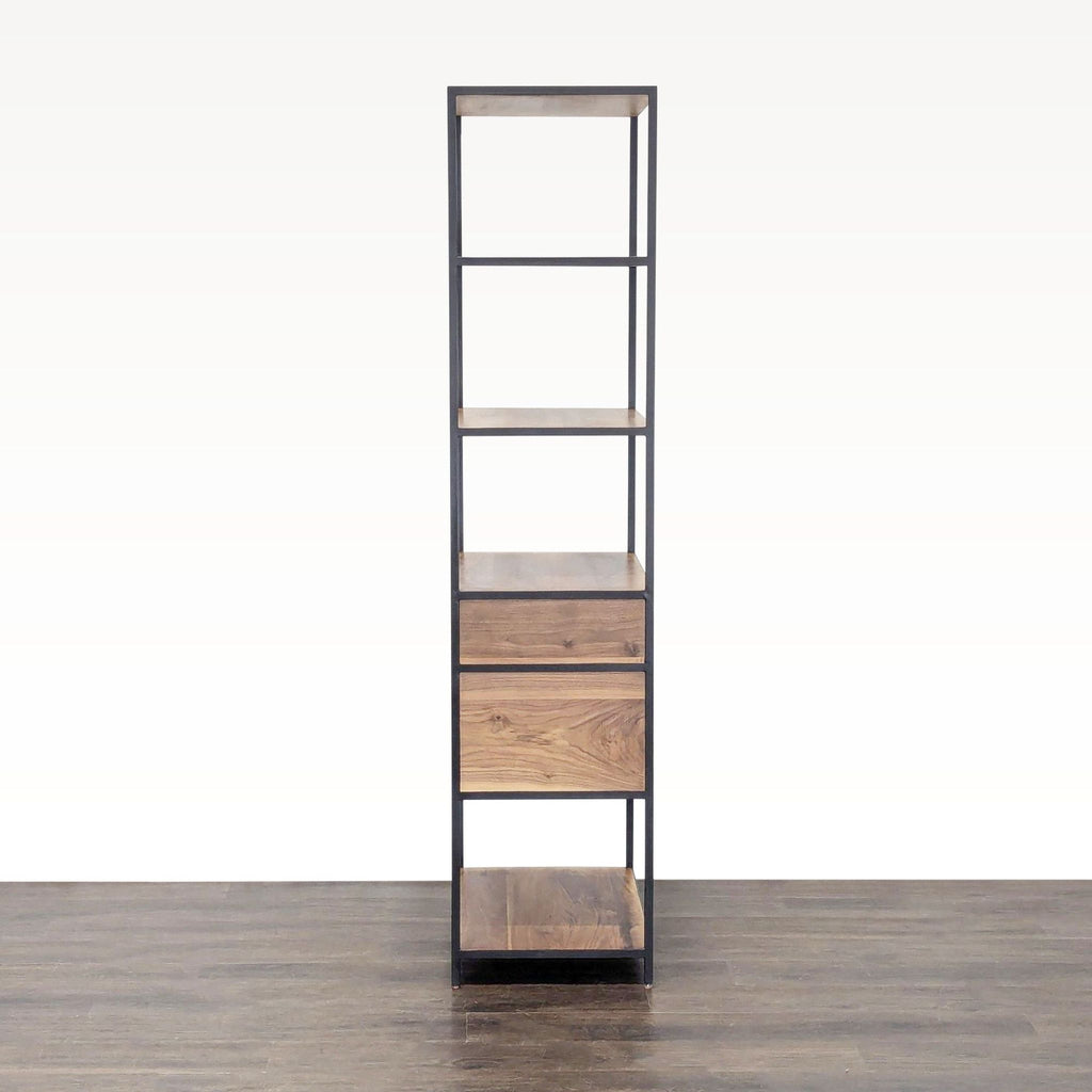 3. Sturdy black frame bookshelf from Crate & Barrel with five wooden shelves, ideal for books and decor.