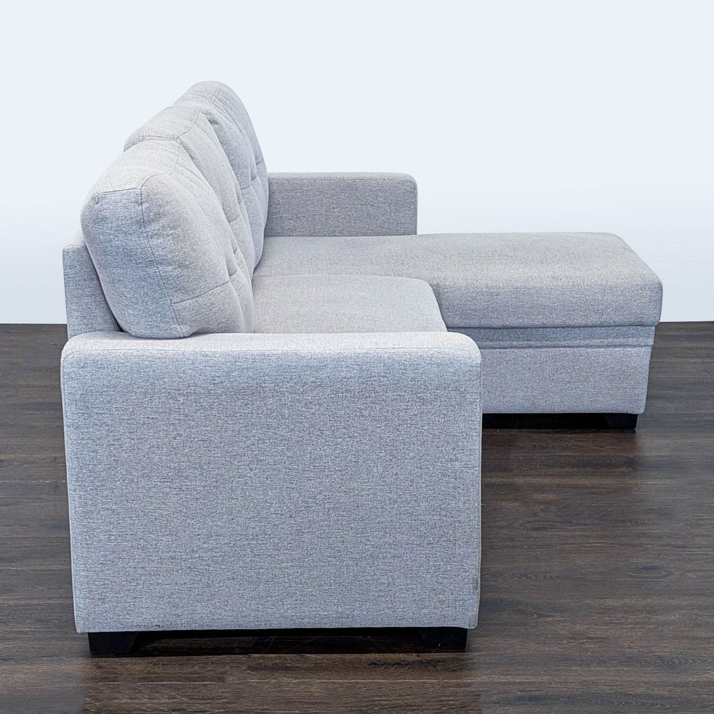 Light Gray Sectional Sofa with Pull-Out Bed and Storage Chaise