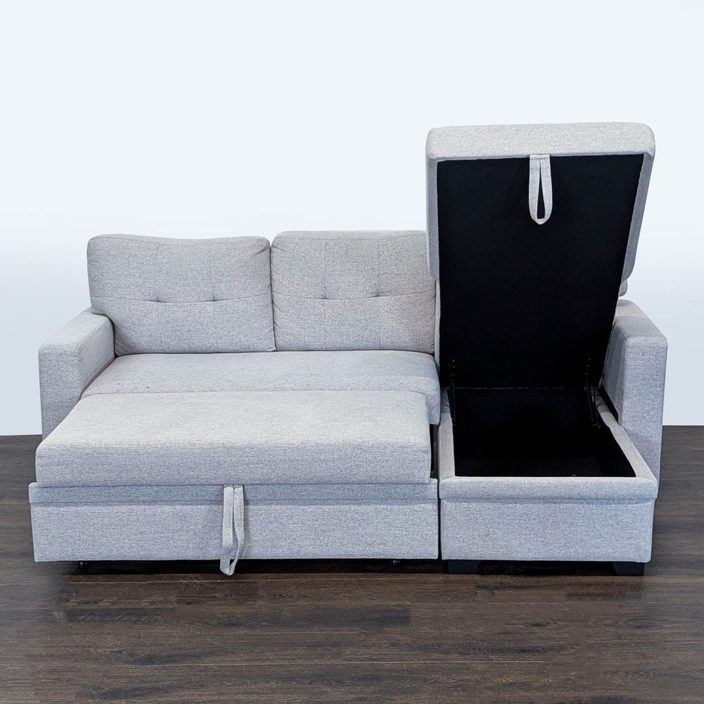 Modern gray sectional featuring a hidden pull-out bed and roomy storage chaise, perfect for versatile living spaces.