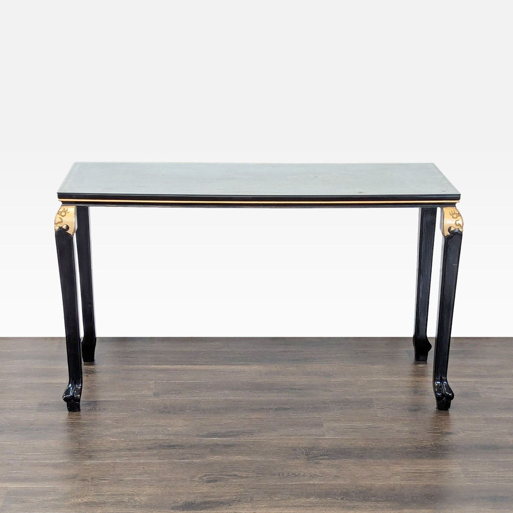 Hand-painted console table with gold-accented border, cabriole legs, and protective glass top.