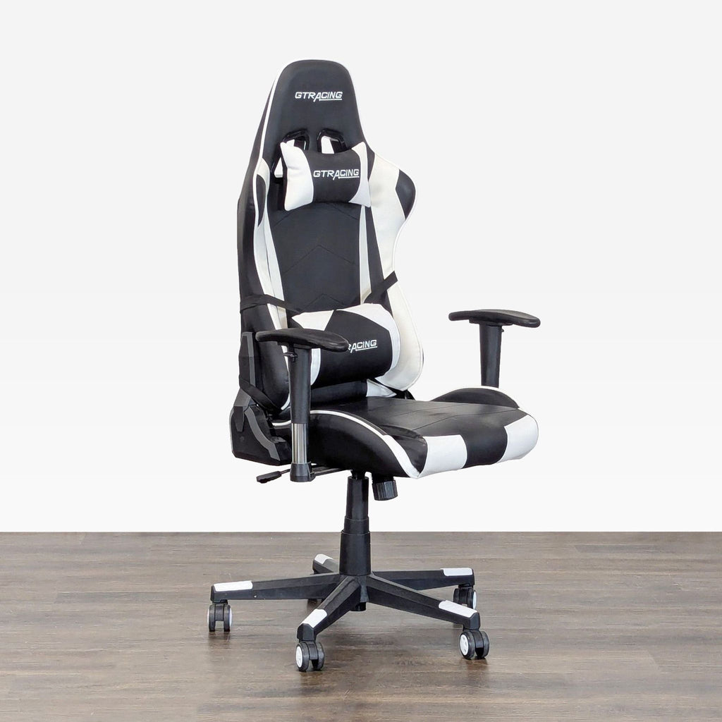 GTRacing chair with high backrest, neck and lumbar pillows, and smooth-rolling wheels, ideal for gaming setups.  