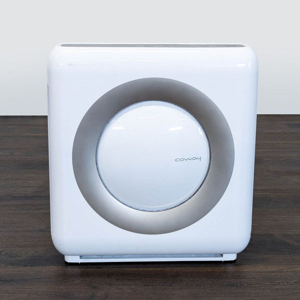 Coway air purifier with a sleek, compact design, suitable for homes or offices in the AC & Fans category.  