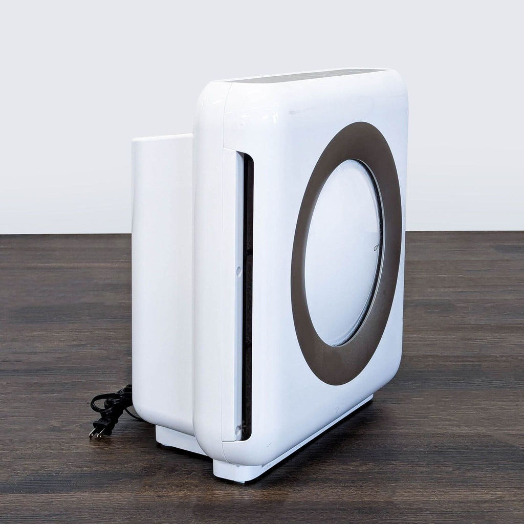Modern Coway air purifier efficiently cleans air in small to medium rooms; fits well in any space.  