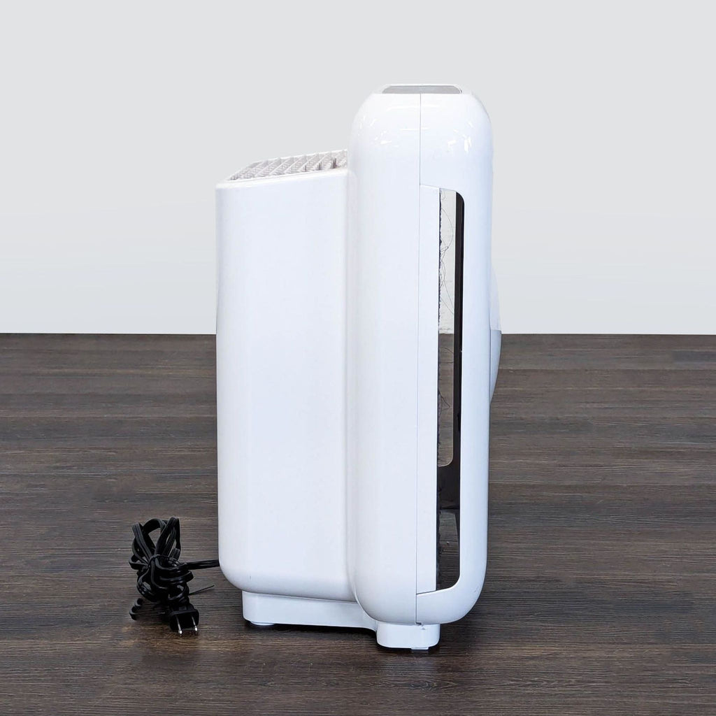 Coway air purifier, easy to use and stylish, ideal for improving room air quality at home or work.
