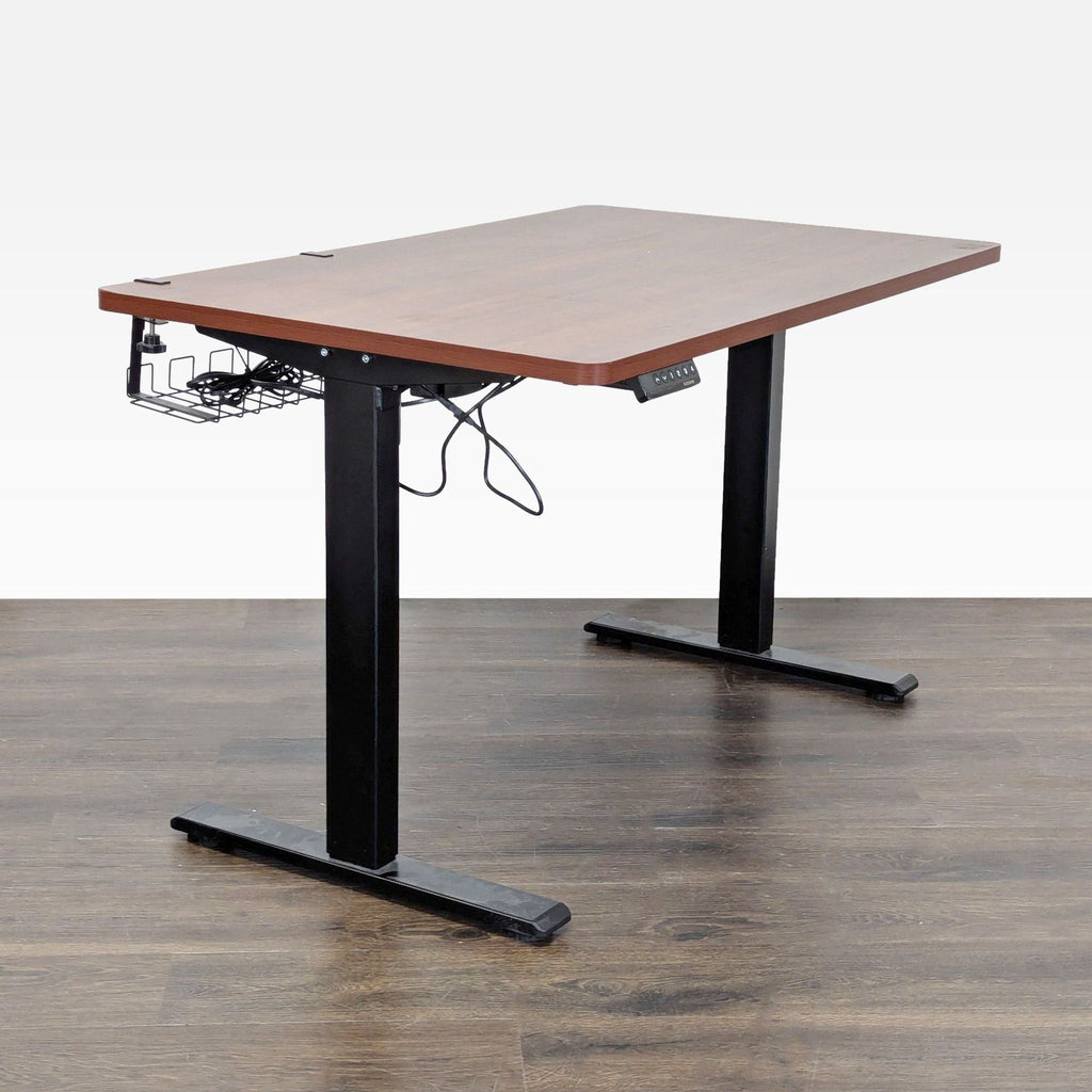 Modern Flexispot adjustable desk featuring digital height panel, wood finish, and organized cable management tray.  