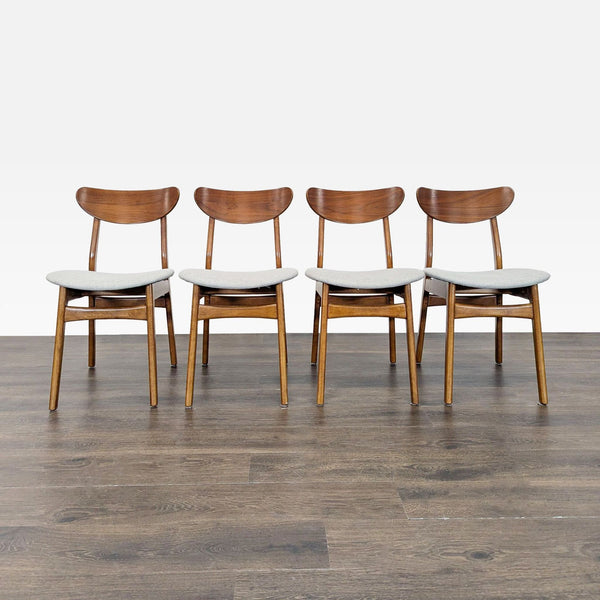 1. Set of four West Elm dining chairs, wood frames with curved backs and light fabric seats, on wood floor.