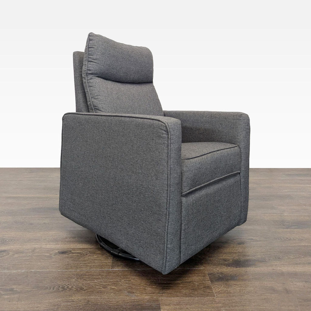 Contemporary gray swivel lounge chair by Davinci with soft fabric and supportive cushioning for versatile comfort.
