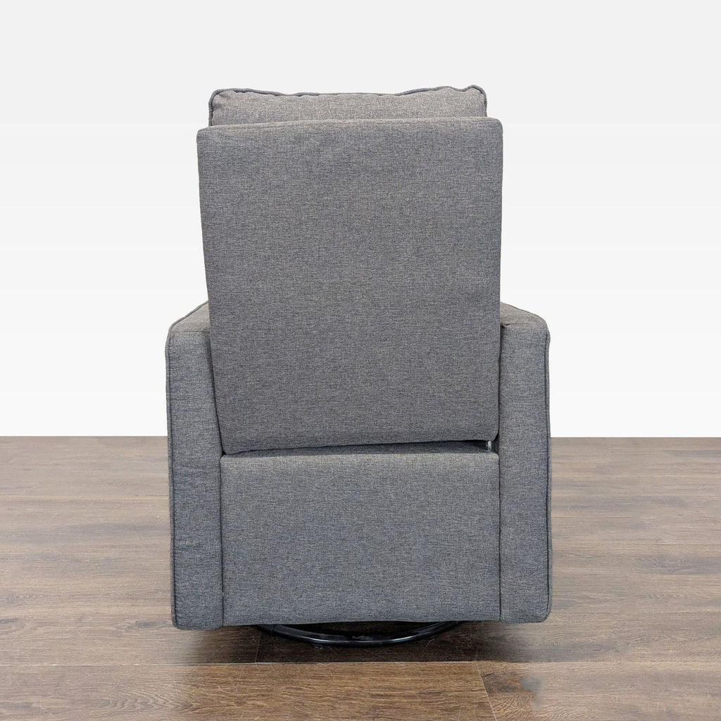 Davinci brand gray lounge chair featuring a sturdy swivel base and minimalist design for stylish relaxation.