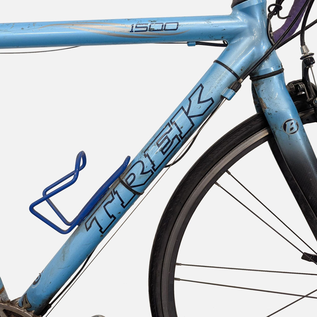 Used Trek 1500 road bicycle featuring lightweight build, quality wheels, and drop bars, suitable for commuting.