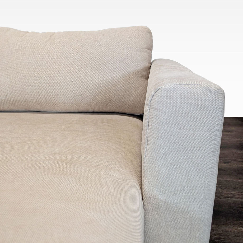 IKEA sectional sofa in neutral beige, featuring a spacious chaise lounge and soft fabric perfect for family spaces.