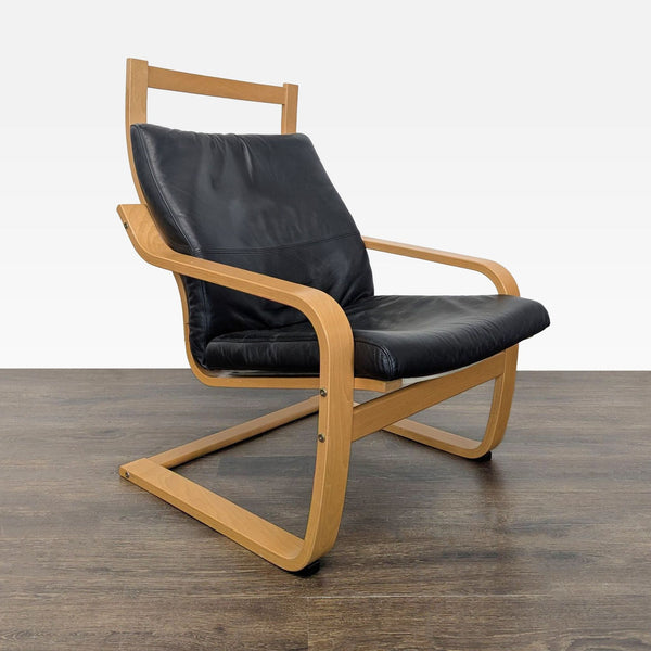 Modern lounge chair with bentwood frame and black leather cushion, ideal for living rooms or offices.