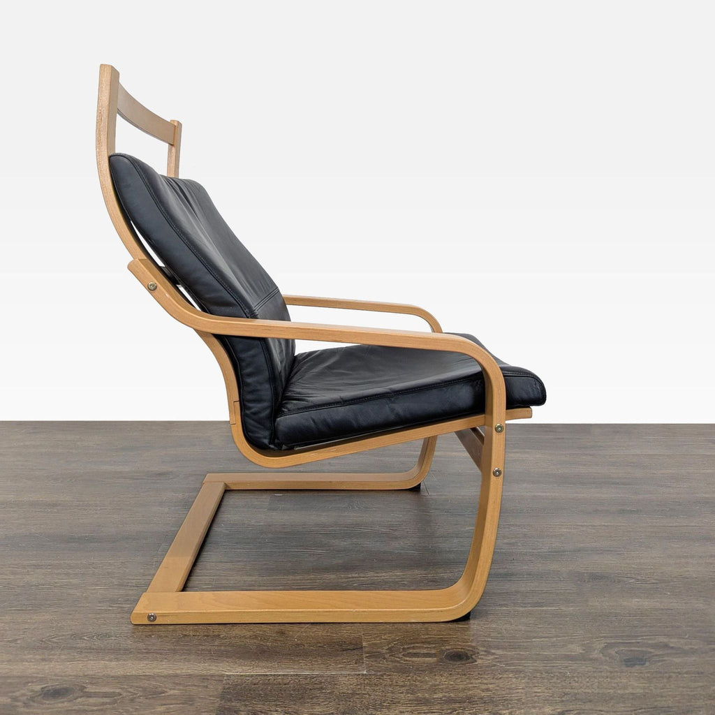 Modern Lounge Chair with Wooden Frame and Black Leather Cushion